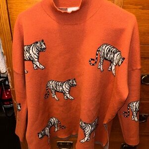Orange Tiger Print Turtleneck Sweater
